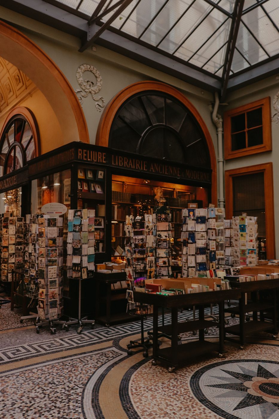 The rotunda of the Galerie Vivienne and its historic bookshop, above the mosaic floor