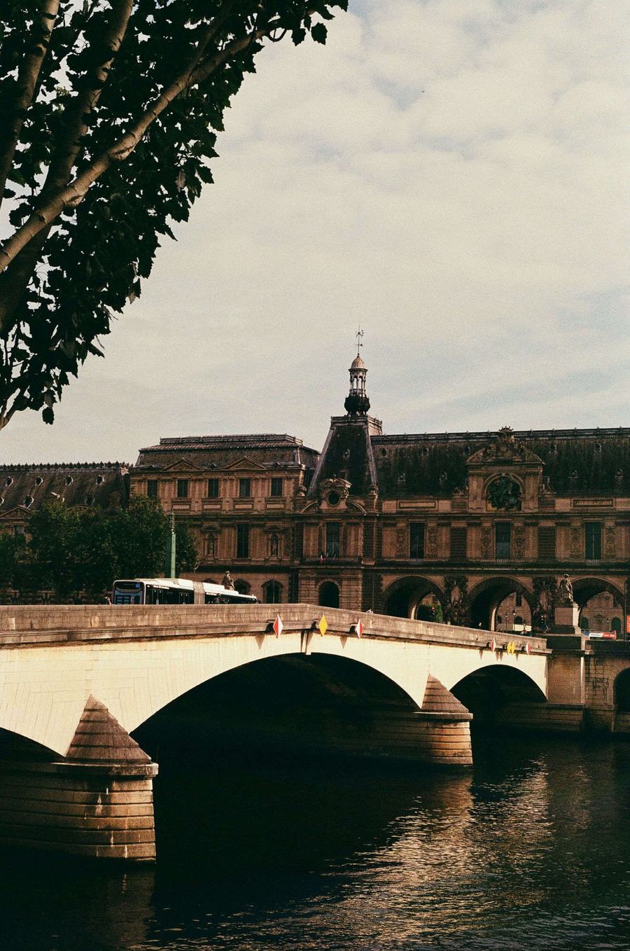 A bridge over the Seine beside the Louvre in Paris